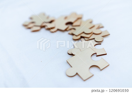 Strategic business puzzle solving office environment image of puzzle pieces collaborative setting creative viewpoint problem-solving concept 120691030