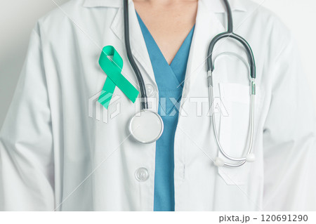 Doctor holding Teal Ribbon for January Cervical Cancer Awareness month. Uterus and Ovaries, Cervix, Endometriosis, Hysterectomy, Uterine fibroids, Reproductive, Healthcare and World cancer day Doctor holding Teal Ribbon for January Cervical Cancer Awareness month. Uterus and Ovaries, Cervix, Endometriosis, Hysterectomy, Uterine fibroids, Reproductive, Healthcare and World cancer day 120691290