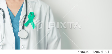 Doctor holding Teal Ribbon for January Cervical Cancer Awareness month. Uterus and Ovaries, Cervix, Endometriosis, Hysterectomy, Uterine fibroids, Reproductive, Healthcare and World cancer day Doctor holding Teal Ribbon for January Cervical Cancer Awareness month. Uterus and Ovaries, Cervix, Endometriosis, Hysterectomy, Uterine fibroids, Reproductive, Healthcare and World cancer day 120691291