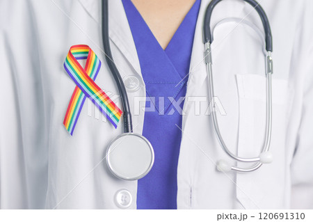 Doctor with LGBTQ Rainbow ribbon for Support Lesbian, Gay, Bisexual, Transgender and Queer community and happy Pride month concept 120691310