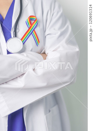 Doctor with LGBTQ Rainbow ribbon for Support Lesbian, Gay, Bisexual, Transgender and Queer community and happy Pride month concept 120691314