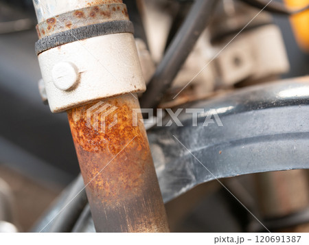 Rusty metal pipe industrial equipment close-up photography workshop setting detailed view maintenance awareness 120691387