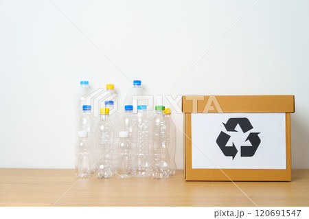 Plastic bottle in paper box at home or office. Recycle garbage Sorting. Plastic Free, Ecology, Environmental, pollution, Dispose recycling, waste management and trash Separation concept Plastic bottle in paper box at home or office. Recycle garbage Sorting. Plastic Free, Ecology, Environmental, pollution, Dispose recycling, waste management and trash Separation concept 120691547