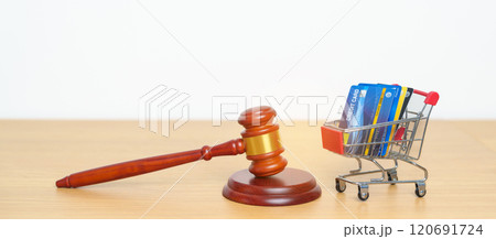 Judge gavel, shopping cart and Credit Card..online auction and bidding, Trade Regulations, Consumer protection Law, online shopping, E commerce, Tax, Digital, justice and judgment concept 120691724