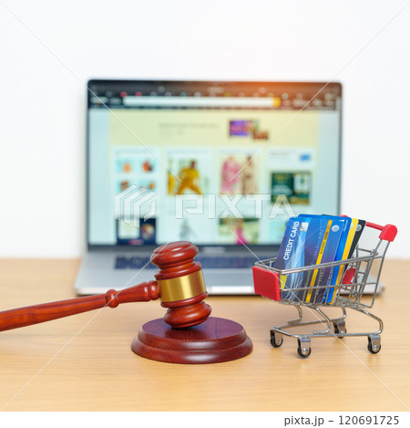Judge gavel, shopping cart, Credit Card and laptop. online auction and bidding, Trade Regulations, Consumer protection Law, online shopping, E commerce, Tax, Digital, justice and judgment concept 120691725