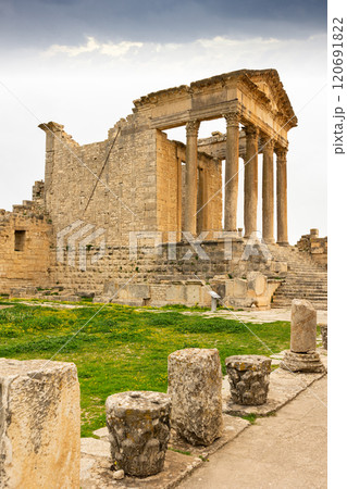 Capitol Temple ruins n Dougga under somber sky, Tunisia 120691822