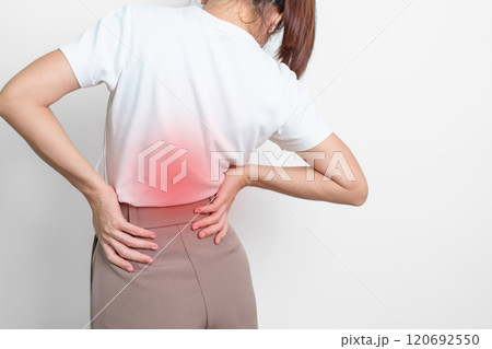 adult female with muscle pain on gray background. Elderly woman having back body ache due to Piriformis Syndrome, Low Back Pain and Spinal Compression. Office syndrome and medical concept adult female with muscle pain on gray background. Elderly woman having back body ache due to Piriformis Syndrome, Low Back Pain and Spinal Compression. Office syndrome and medical concept 120692550