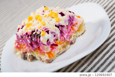 Photography of plate with Dressed herring is russian traditional dish Photography of plate with Dressed herring is russian traditional dish 120692807