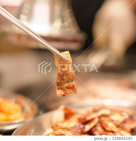 Chef Grilling meat pork on stove serve in restaurant. Korean food and BBQ traditional style 120693197