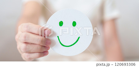 Woman show Happy Smile face paper, Mental health Assessment, Psychology, Health Wellness, Feedback, Customer Review, Experience, Satisfaction Survey, Positive Thinking and World Mental Health day 120693306