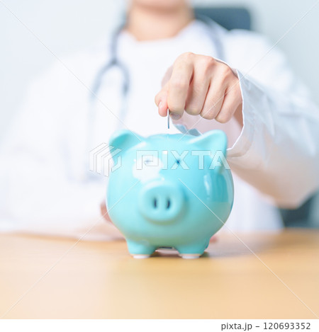 Doctor holding piggy bank and putting coin. and Healthcare cost, Money Saving, Health Insurance, Medical, Donation and Financial concepts Doctor holding piggy bank and putting coin. and Healthcare cost, Money Saving, Health Insurance, Medical, Donation and Financial concepts 120693352