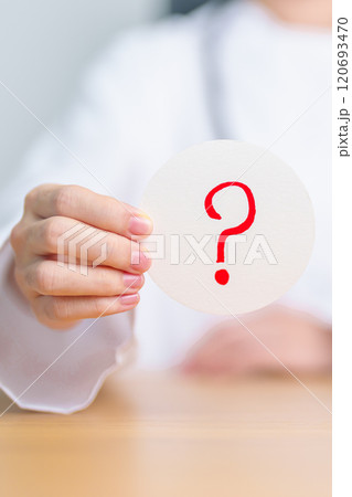 Doctor show Questions Mark ( ? ) on paper. FAQ, frequency asked questions, Answer, Information, Communication, Health, Diagnosis  and Medical concept 120693470