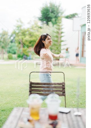 Happy woman with Dessert in cafe, young Asian girl smiling during eating cake and drinking ice beverage at home 120693636