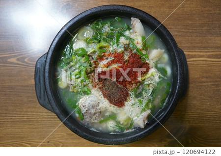 Blood Sausage and Rice Soup in earthen pot 120694122