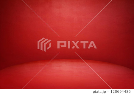 The floor and walls of the room are red as the background. The floor and walls of the room are red as the background. 120694486