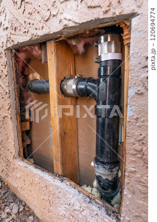 Plumbing Repair Service. Cut Out External Wall of House with Fixed, Replaced Pipe. Repairing Water Supply. No People. Construction. Vertical Plane. Maintenance of Leakage Plumbing Repair Service. Cut Out External Wall of House with Fixed, Replaced Pipe. Repairing Water Supply. No People. Construction. Vertical Plane. Maintenance of Leakage 120694774