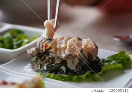 Eat fresh abalone sliced Eat fresh abalone sliced 120695115