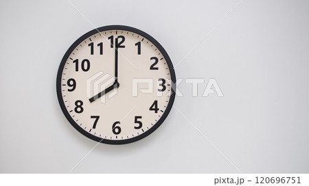 Classic Black-Edged Clock on White Background at 20.00/08.00 - Perfect for Time Management and Text Space 120696751