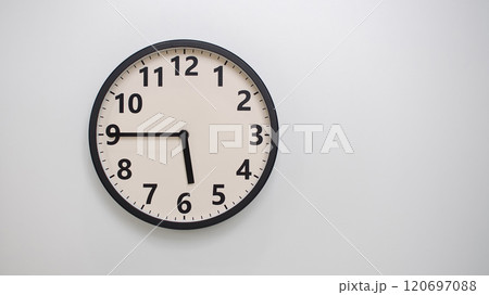 Classic Black-Edged Clock on White Background at 17.45/05.45 - Perfect for Time Management and Text Space Classic Black-Edged Clock on White Background at 17.45/05.45 - Perfect for Time Management and Text Space 120697088
