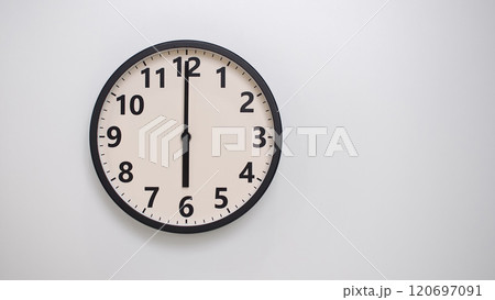 Classic Black-Edged Clock on White Background at 18.00/06.00 - Perfect for Time Management and Text Space 120697091