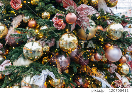New Year's colorful trees in front of the Central Department Store in Moscow on Kuznetsky Most 120700411
