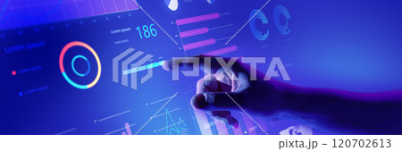 Hand interacting with comprehensive business dashboard displaying various data insights and performance graphs. 120702613