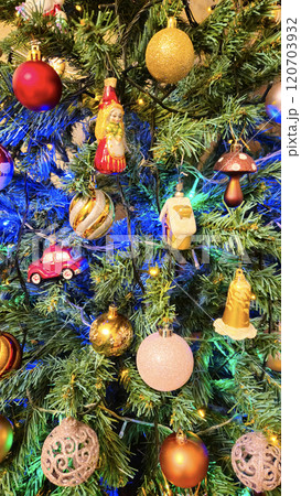 Christmas tree decorated with variety toys, holiday background 120703932