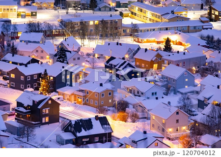 Norwegian city of Tromso. Little glowing snowy fairy houses at christmas Norwegian city of Tromso. Little glowing snowy fairy houses at christmas 120704012