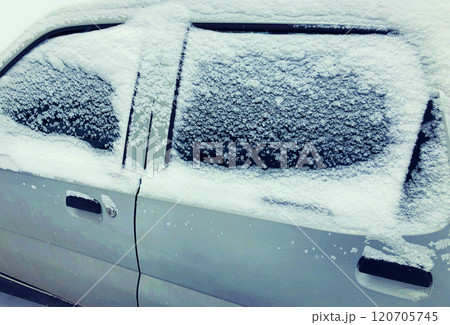 Close up frozen winter car covered snow, view side window on snowy background Close up frozen winter car covered snow, view side window on snowy background 120705745