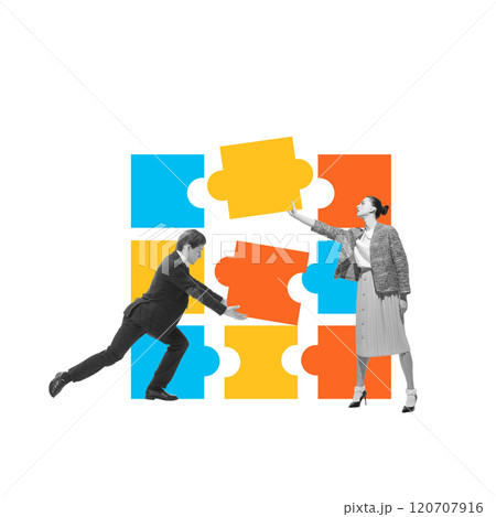 Two business professionals working together to assemble puzzle pieces, representing problem-solving, synergy and teamwork. Conceptual design. 120707916