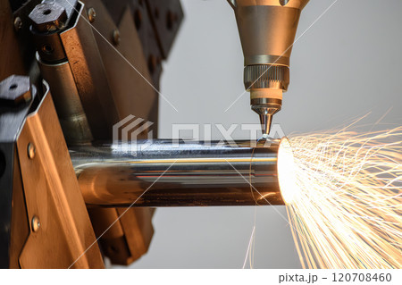 Close up scene the fiber laser cutting machine cut the stainless steel tube and sparkling light. Close up scene the fiber laser cutting machine cut the stainless steel tube and sparkling light. 120708460