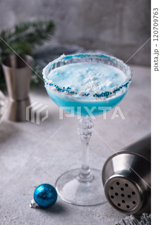 Christmas cocktail with blue curacao Christmas cocktail with blue curacao 120709763