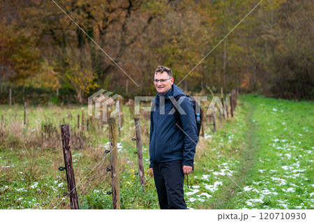 Outdoor portrait of a 45 yo white hiking man in an autumn forest in Oud Heverlee, Belgium 120710930