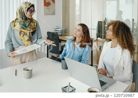 Discussing Business Strategy During Office Meeting 120710987