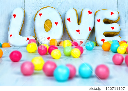 Homemade cookies in the form of a heart or I love you words as a gift to a beloved on Valentine's Day. Homemade cookies in the form of a heart or I love you words as a gift to a beloved on Valentine's Day. 120711197