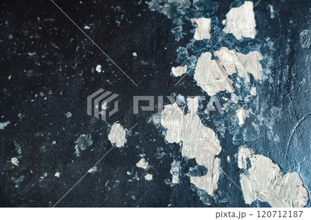 Texture of peeling paint on a dark surface with a unique pattern 120712187
