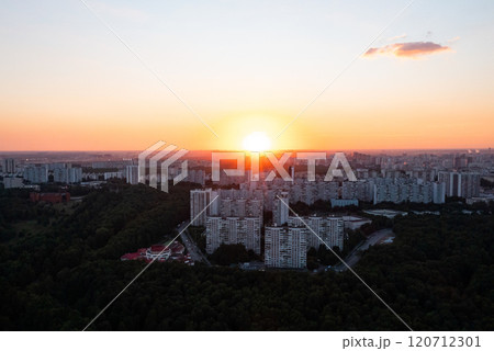 Breathtaking sunset over the city skyline revealing urban architecture and nature embraced at twilight 120712301