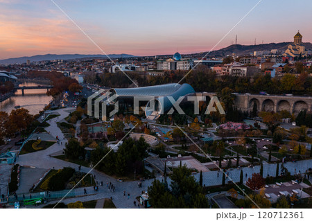 Autumn colors paint the vibrant cityscape of Tbilisi, Georgia with a stunning sunset backdrop 120712361
