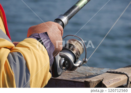 Fisherman with rod, spinning reel , Fisherman with rod, spinning reel , 120712560