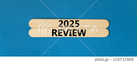 Planning 2025 review new year symbol. Concept words 2025 Review on beautiful wooden sticks. Beautiful blue background. Business 2025 review new year concept. Copy space. 120712808