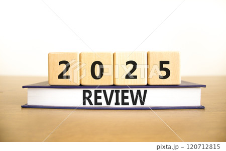Planning 2025 review new year symbol. Concept words 2025 Review on beautiful wooden blocks and book. Beautiful wooden table white background. Business 2025 review new year concept. Copy space. 120712815