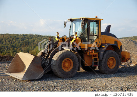 Heavy-Duty Front Loader at Construction Site 120713439