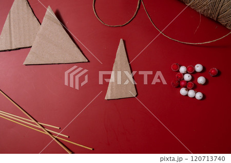 Rope Christmas trees Storytelling creating craft Christmas holiday present. Tactile hand-on activity. Master class progress of creative me-made gifts. Seasonal domestic life micro moment hobby 120713740