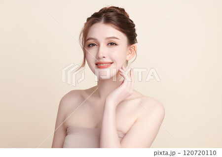 Beautiful young asian woman with clean fresh skin on beige background, Face care, Facial treatment, Cosmetology, beauty and spa, Asian women portrait. Beautiful young asian woman with clean fresh skin on beige background, Face care, Facial treatment, Cosmetology, beauty and spa, Asian women portrait. 120720110