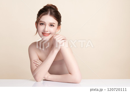 Beautiful young asian woman with clean fresh skin on beige background, Face care, Facial treatment, Cosmetology, beauty and spa, Asian women portrait. Beautiful young asian woman with clean fresh skin on beige background, Face care, Facial treatment, Cosmetology, beauty and spa, Asian women portrait. 120720111
