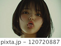 上から目線で舌を出している日本人女性 120720887