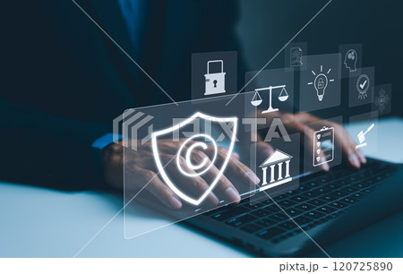 Digital copyright protection concept. Hand typing on laptop with digital icons representing copyright, intellectual property, patent, and security, protecting digital assets and information. trademark Digital copyright protection concept. Hand typing on laptop with digital icons representing copyright, intellectual property, patent, and security, protecting digital assets and information. trademark 120725890