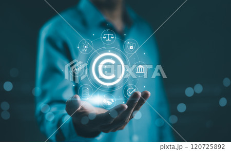 Digital copyright, patent concept. Businessman hold digital icons representing copyright, intellectual property, patents, legal protection, and safeguarding digital and intellectual assets. trademark, Digital copyright, patent concept. Businessman hold digital icons representing copyright, intellectual property, patents, legal protection, and safeguarding digital and intellectual assets. trademark, 120725892