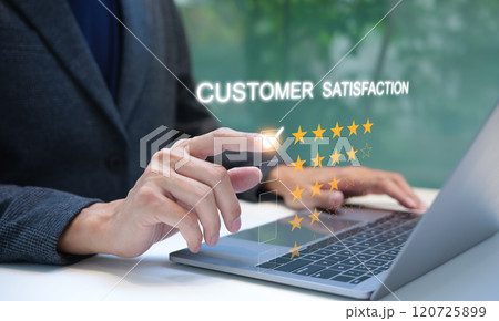 Rating Customer Satisfaction Online. Businessman interacting with customer satisfaction rating interface on a laptop, selecting five stars for high satisfaction. feedback survey concept, Review stars, 120725899