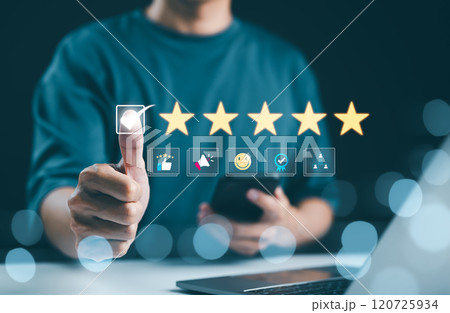 Customer Satisfaction Rating and Feedback Concept. Man interacting with a digital customer satisfaction survey, emphasizing high-quality service and customer feedback. user experience, review stars, 120725934